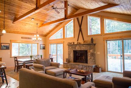 Great room with plenty of natural light and access to deck with gas