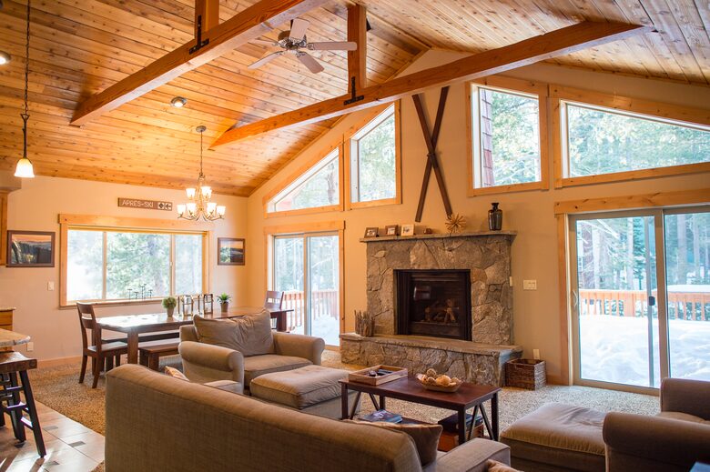 Great room with plenty of natural light and access to deck with gas