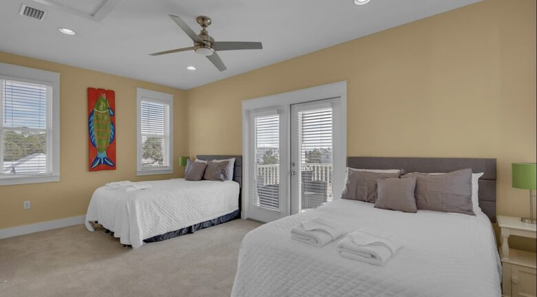 Top floor sunny bedroom with two balconies & bathroom