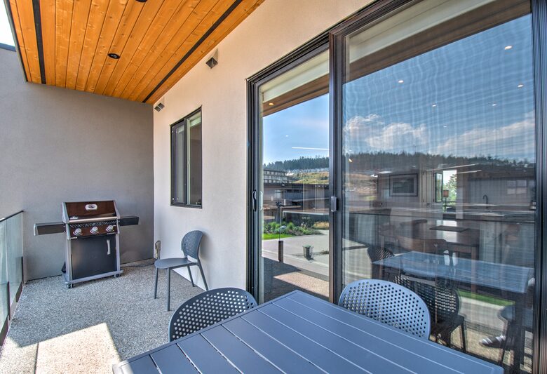 The balcony off the kitchen has a grill with gas line.