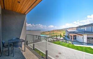 Enjoy coffee with a view from the kitchen balcony.