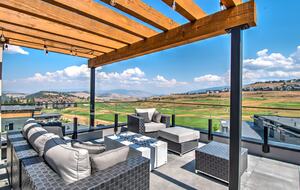 Roof deck with firepit and golf course views