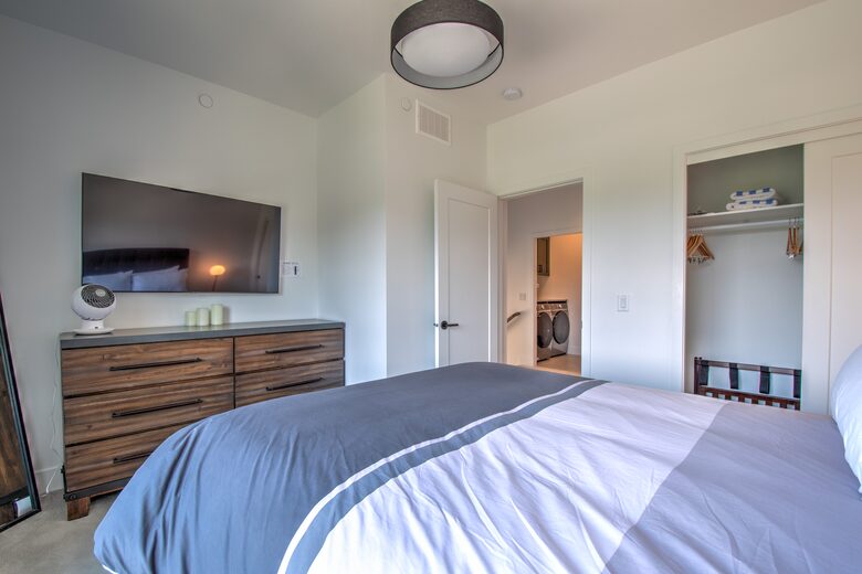 Second bedroom with Queen Bed shares a bath