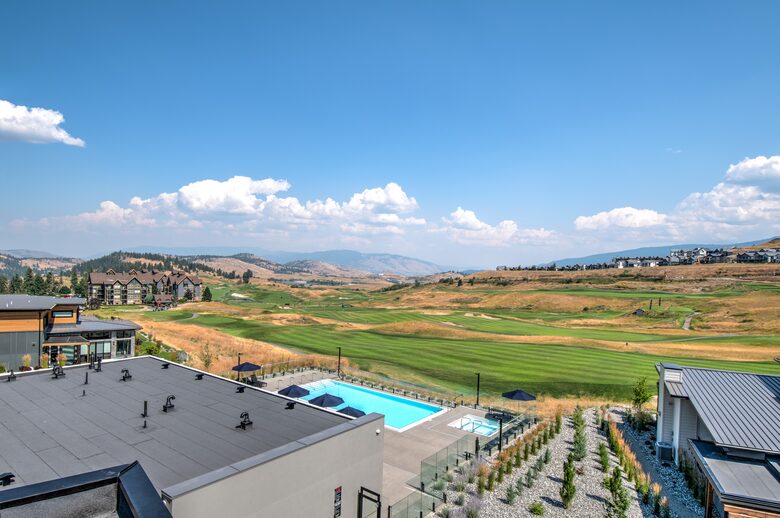 View of pool and golf course from townhouse