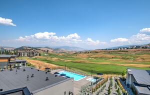 View of pool and golf course from townhouse