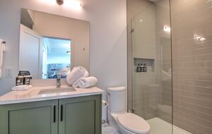 Private bath with shower for lower-level bedroom