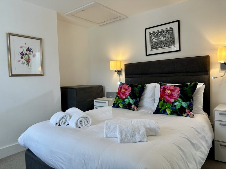 Bedroom 2 with original artwork