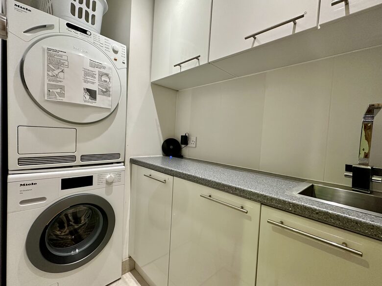 Utility with Miele washing machine and tumble dryer