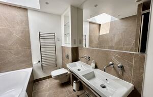 Bathroom 1 with bathtub, separate shower and double sink