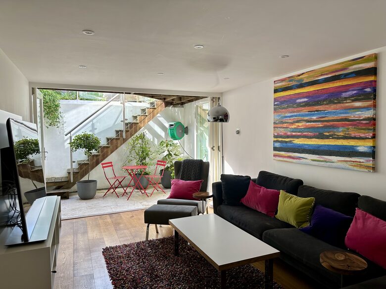 Living Room with steps up to the garden
