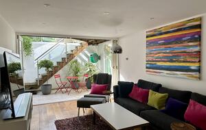 Living Room with steps up to the garden