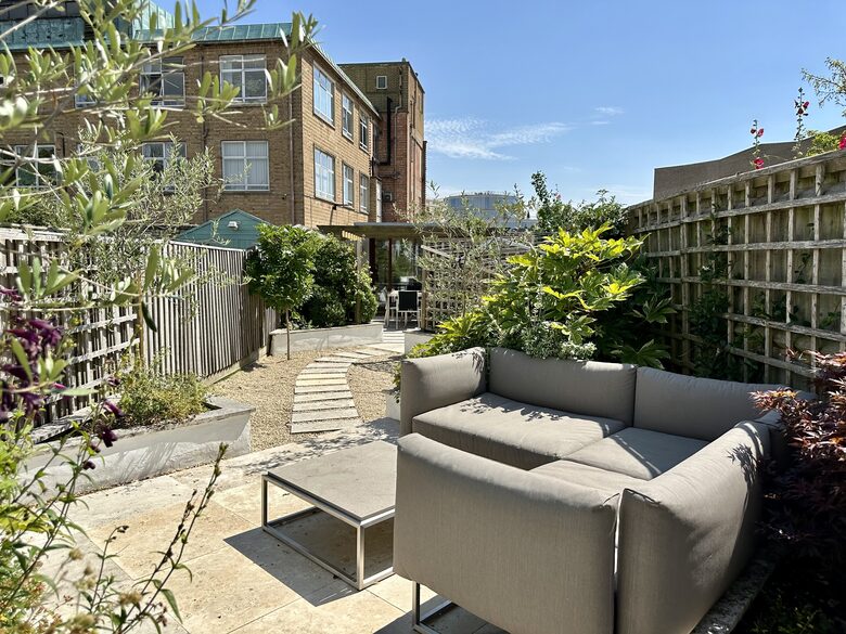 Garden sofa and view to Garden Office/studio