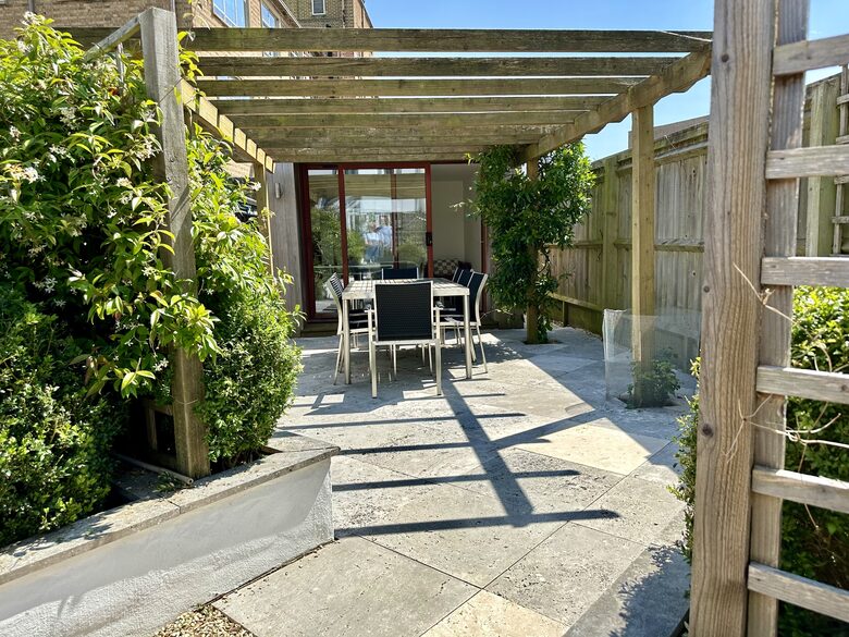 Pergola with seating for 8 outside the Garden Office/studio