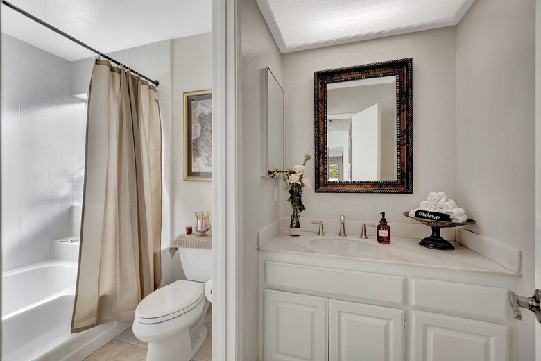 Bathroom 3 with shower and soaking tub.