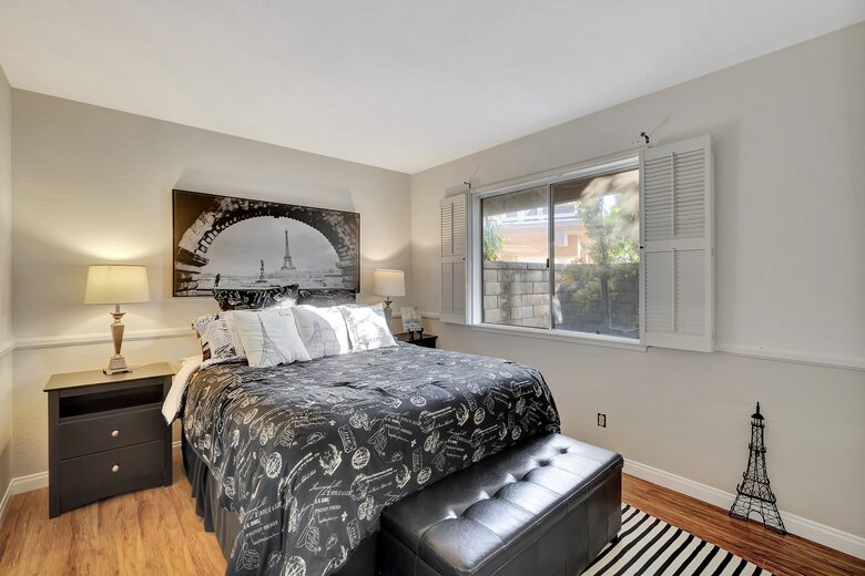 Paris room with queen bed.