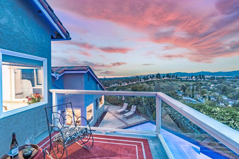 Private balcony off of primary bedroom w/amazing views.