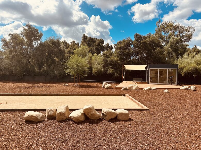Bocce + Library with epic views from backyard