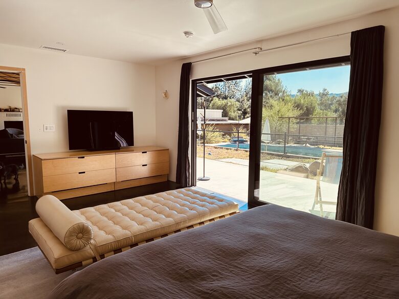 Master opens to back patio and pool