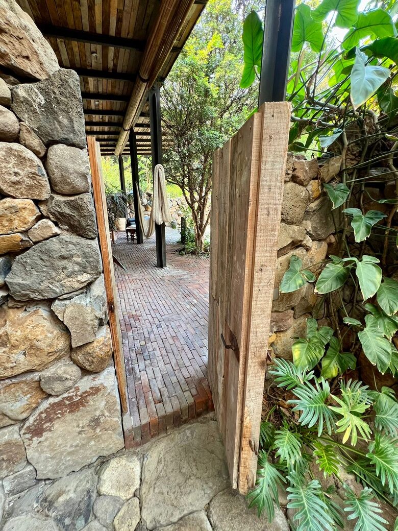 View to the terrace from the outdoor shower