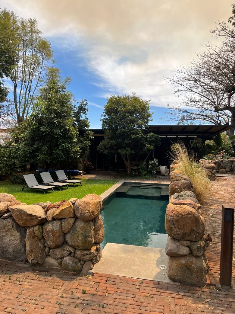 View to the pool from the fireplace