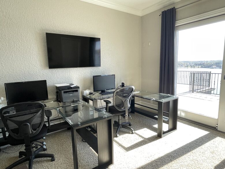 Fully equipped office to plug laptops into with a pullout couch
