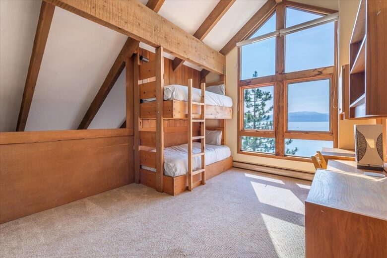 Loft with bunk beds and desk