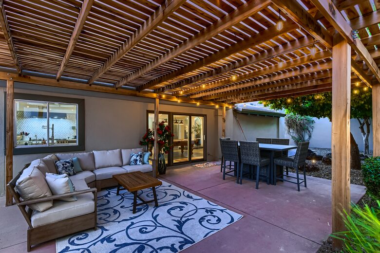 Outdoor seating area and dining table with fire pit
