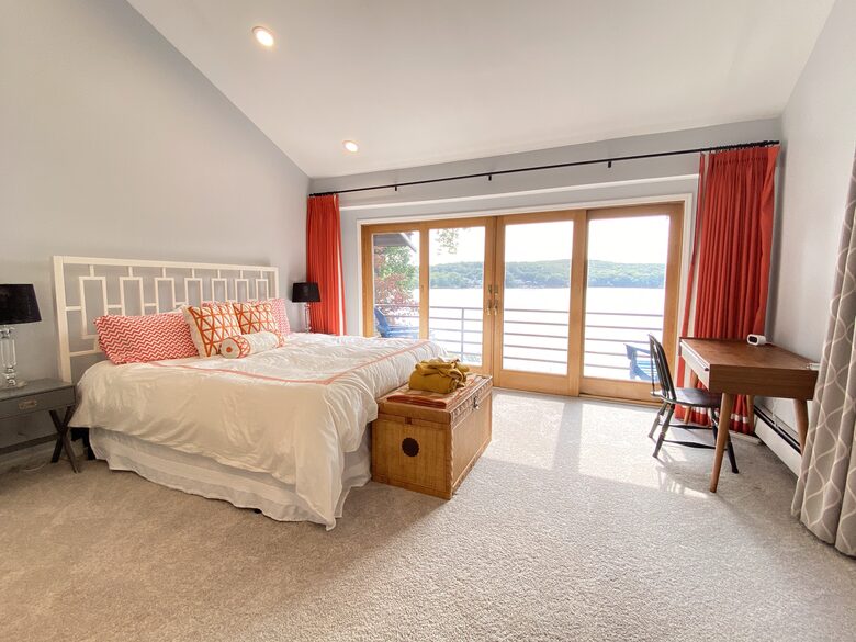 Primary Bedroom with lake views