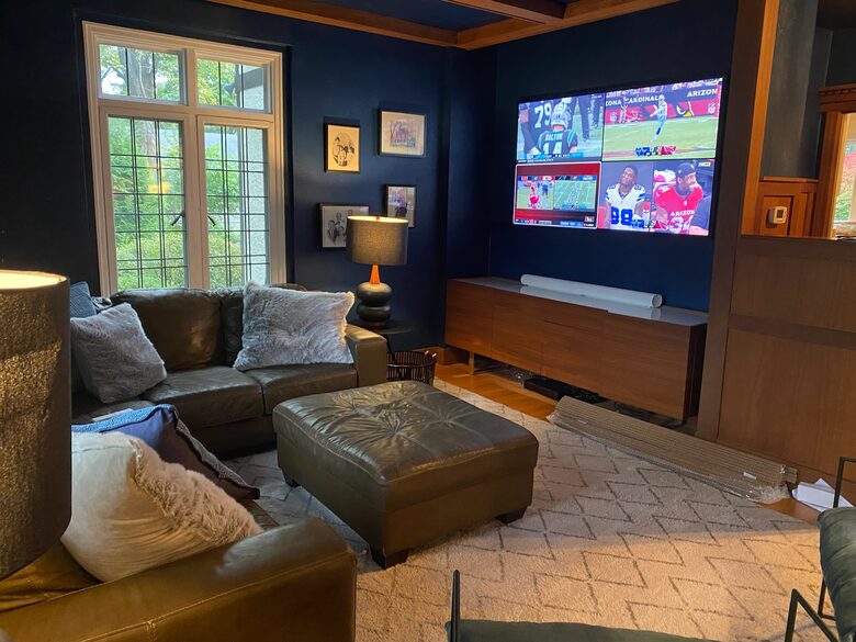Cozy den with large screen smart TV