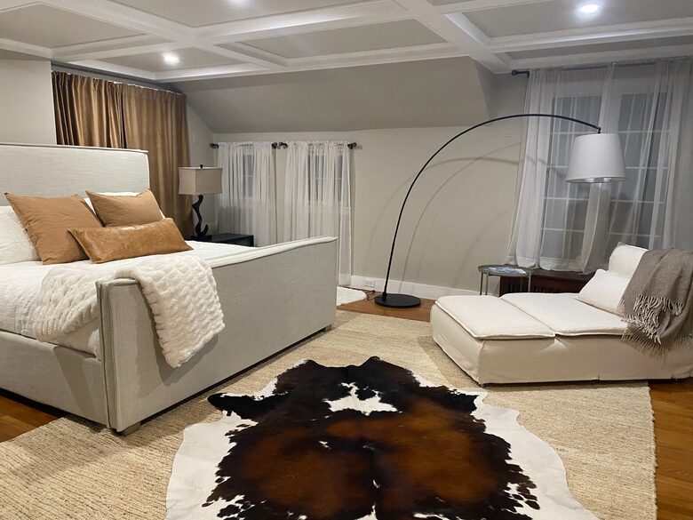Master bedroom with plush king mattress