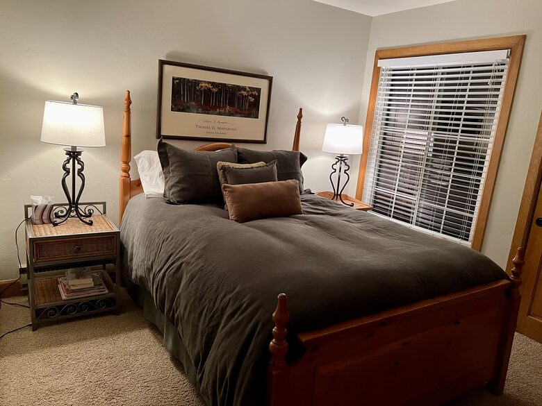 Bedroom 2 with queen sized bed also on main level