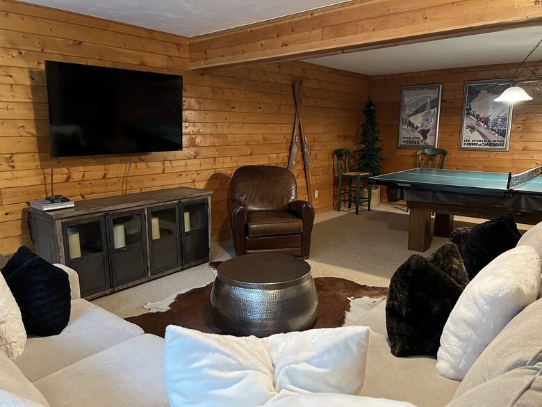 Lower level has Recreation Room with TV, pool and ping pong