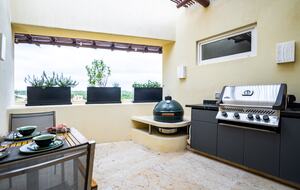 Barbecue terrace and herb garden
