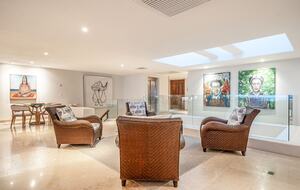 Exquisite art collection and custom furnishing throughout