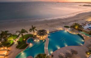 View of pool and beach from terrace