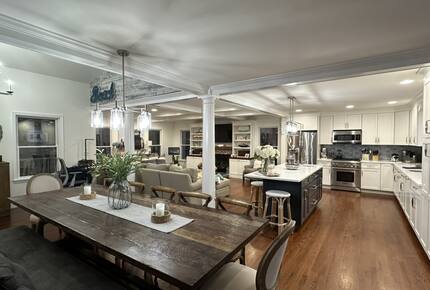 Open concept Living with 12-seat dining table