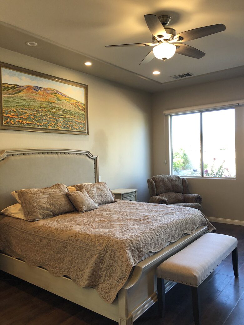 Primary bedroom with king bed, walk-in closet, ensuite