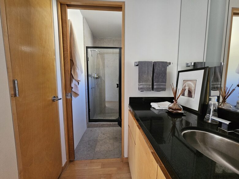 Bedroom 1 bathroom with shower