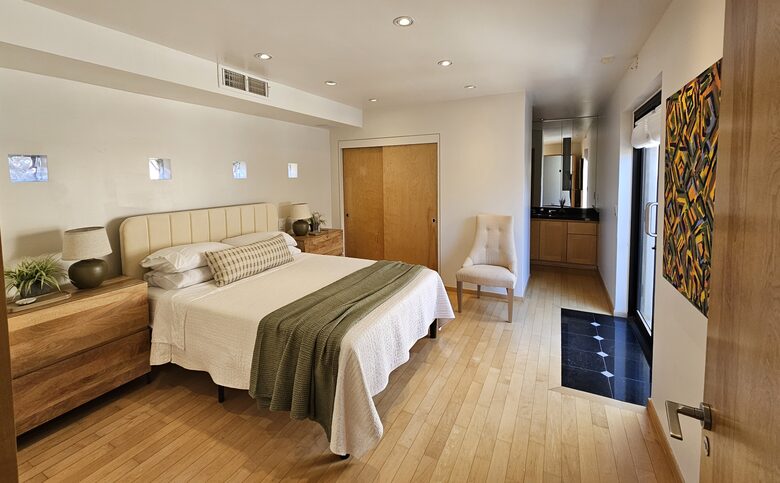 Bedroom 1 with access to patio