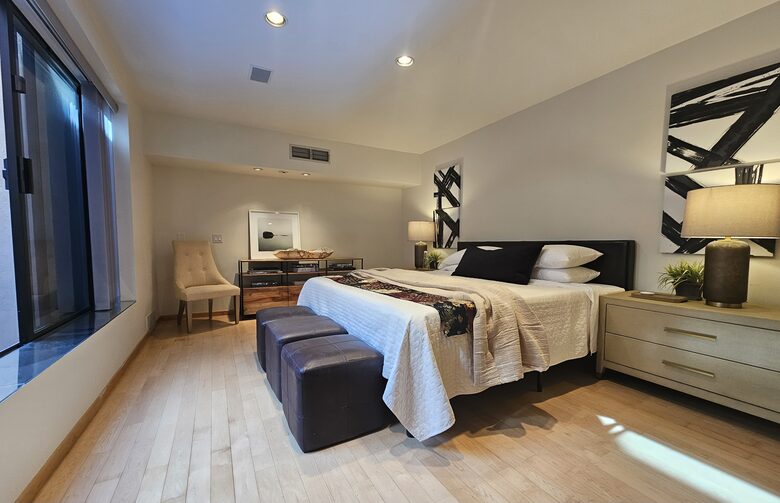 Bedroom 2 opens to patio with fountain pool
