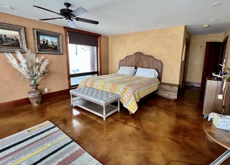 Lower level master bedroom with King bed and eco mattress with topper