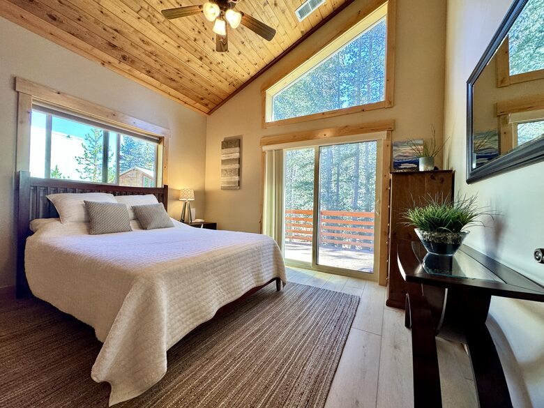 Second bedroom with queen bed and en suite bathroom