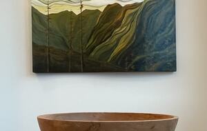 Original art and local artisan objects throughout house