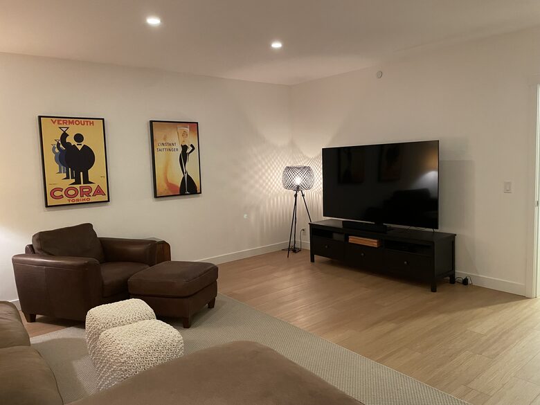 Media room with 80” TV and Sonos surround