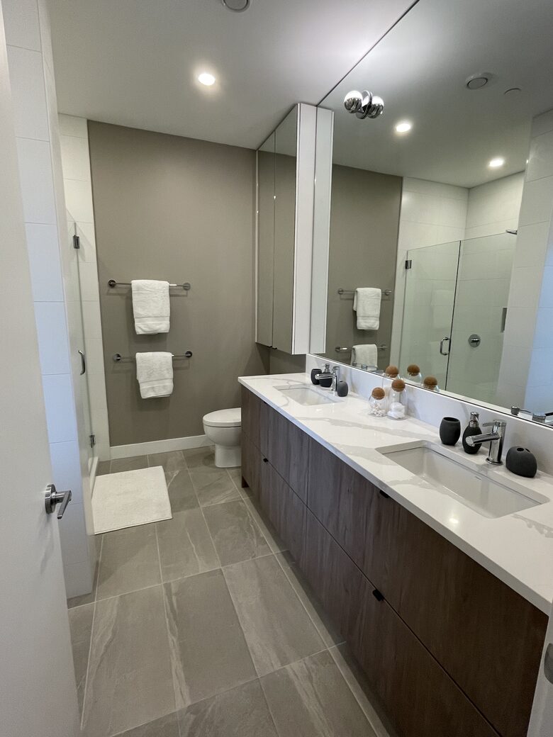 Primary ensuite with separate oversized shower and tub
