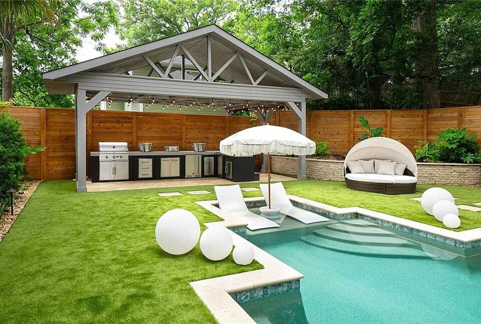 Outdoor kitchen with BBQ grill, ice maker & Fridge