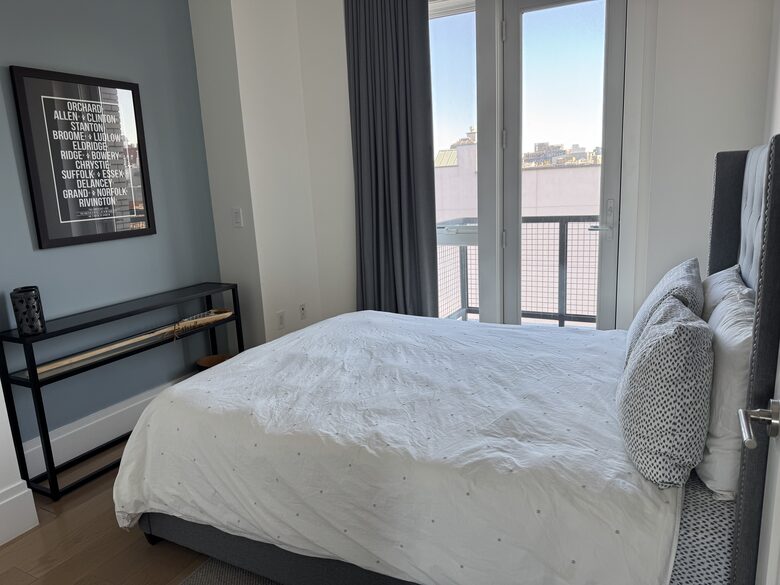 Guest bedroom on 1st fl. Small terrace facing east, sunrise views