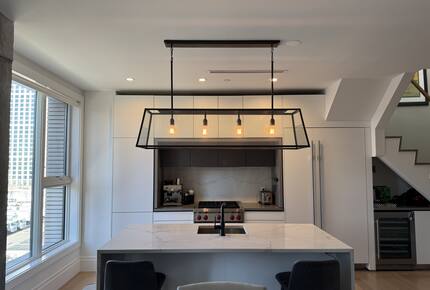 Kitchen on 1st fl.  Floor-ceiling windows facing NYC, sunset views