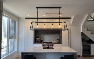 Kitchen on 1st fl. Floor-ceiling windows facing NYC, sunset views