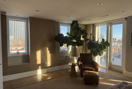 Primary BR on 2nd fl.  Floor-ceiling windows facing east, sunrise view